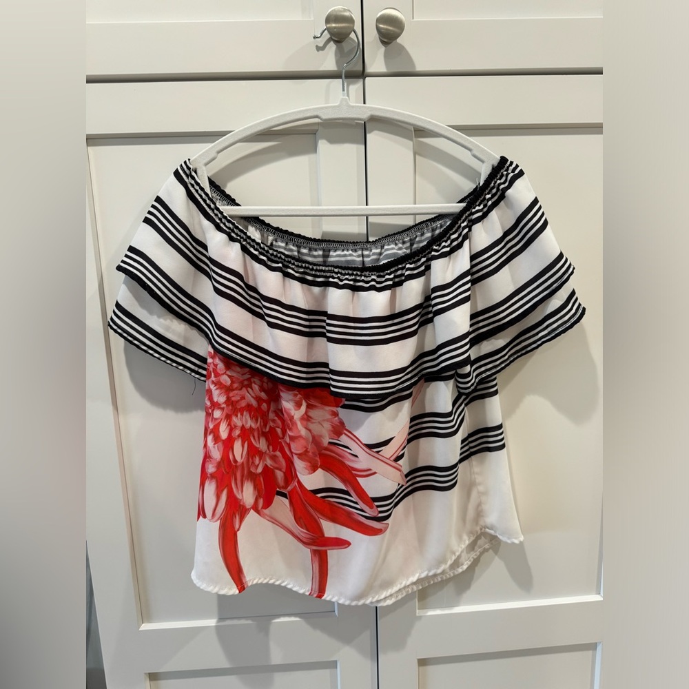 Off shoulder blouse.